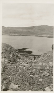 Image: Donald MacMillan walking toward shore